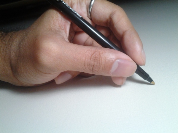 Note how little effort is needed to hold the pen.